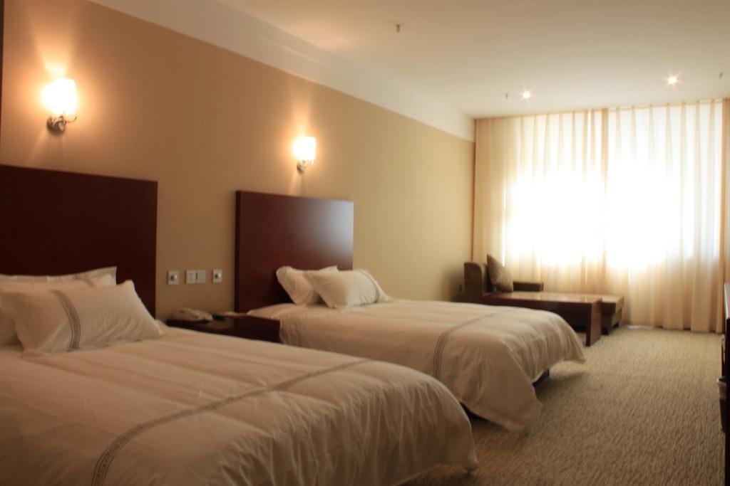 Zhou Wang Cheng Hotel Luoyang  Oda fotoğraf